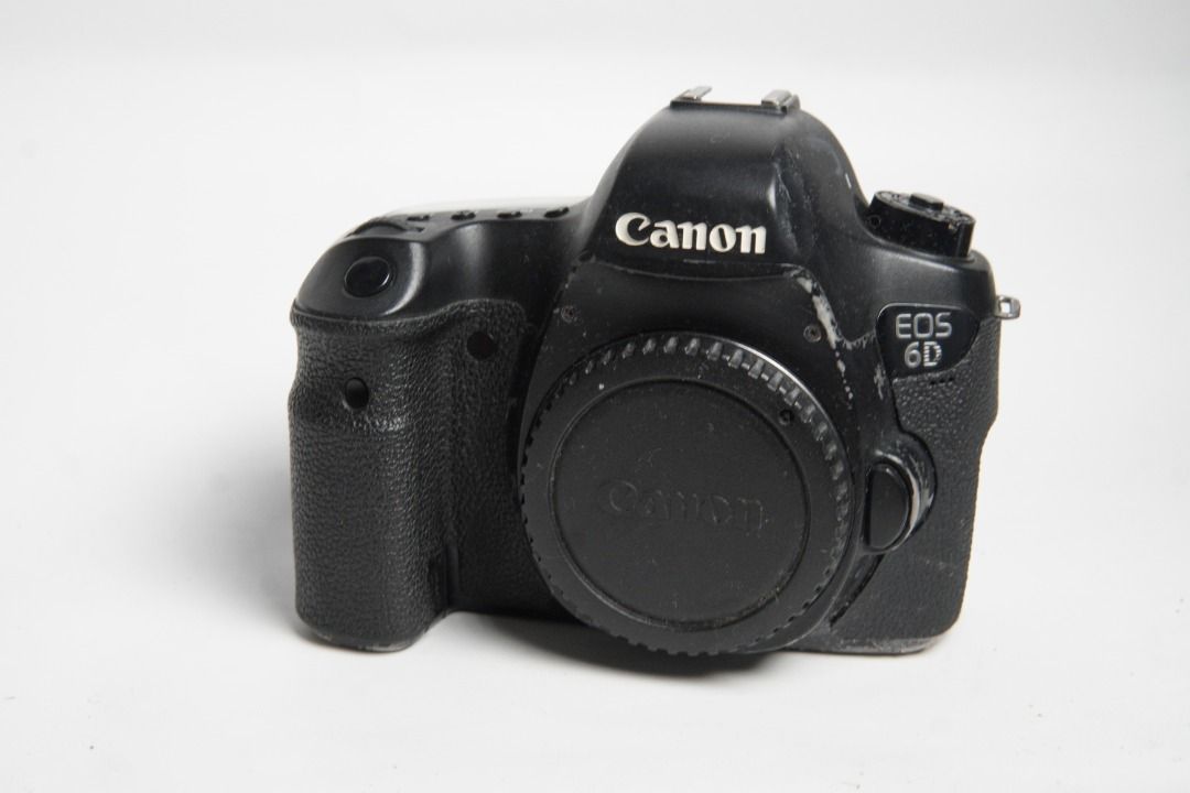 Canon EOS 6D DSLR Camera Body (Category: Cameras) located in Tarlac. Submitted by tristanananan (Listing ID 1447226590, Image 1). Description: - Canon EOS 6D Full-Frame DSLR Camera Body Issues: -Lots of wear -Battery door detaches -Missing rubber.