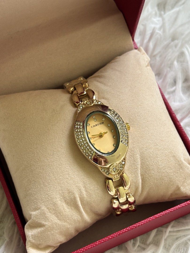 Cartier Gold Watch with Diamonds (Category: Luxury Watches) located in Agdangan. Submitted by jannakim (Listing ID 1447116381, Image 2). Description: - Genuine Cartier watch - Elegant oval face with diamond accents - Comes with original Cartier box - A beautiful statement piece for any occasion - Ideal for gifting - Topgrade.