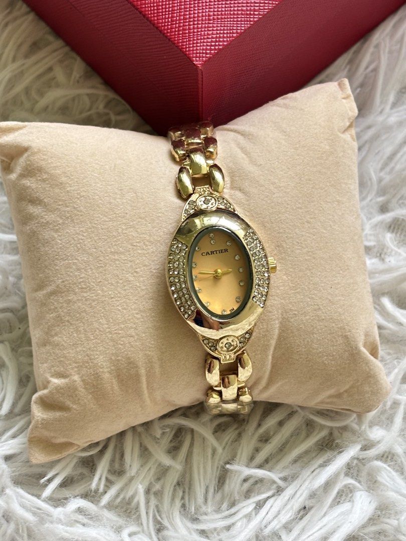 Cartier Gold Watch with Diamonds (Category: Luxury Watches) located in Agdangan. Submitted by jannakim (Listing ID 1447116381, Image 3). Description: - Genuine Cartier watch - Elegant oval face with diamond accents - Comes with original Cartier box - A beautiful statement piece for any occasion - Ideal for gifting - Topgrade.