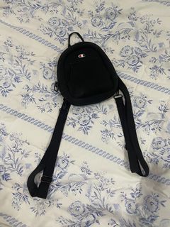 champion reverse weave mini backpack Steady this coated polyester pack protects your tech with a padded laptop sleeve while keeping you organized with multiple storage compartments Champion Reverse Weave Mini Coral