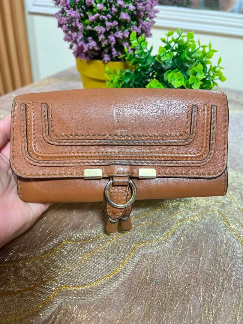 CHLOÈ Beige Leather MARCI Long Bifold Wallet (Category: Luxury Bags & Wallets) located in Lapu Lapu. Submitted by glamorouslybeautiful8.0 (Listing ID 1447117586, Image 1). Description: ☘️♥️👜C H L O E Beige Leather Marci Long Bifold Wallet (vintage) Made in Spain coded with hologram sticker whooaaahhh gorgeous vintage‼️‼️ Rare Finds!🔥🔥MUST HAVE⚡️⚡️ genuine soft leather wallet brass gold hardwares sign of usage 🌷flaws: darken leather as shown, 