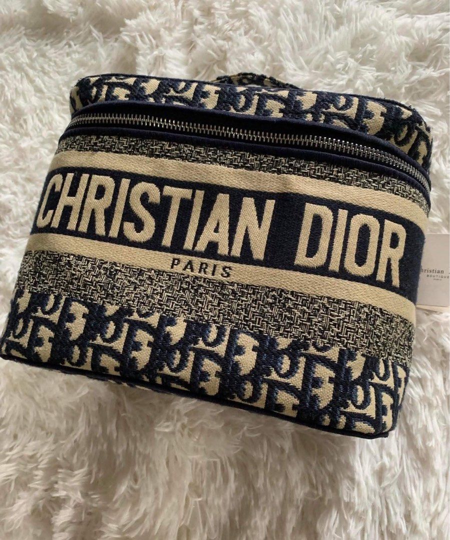 Christian Dior Vanity Case Dior Oblique Canvas (Category: Luxury Bags & Wallets) located in Dasmarinas. Submitted by starseares (Listing ID 1447268514, Image 3). Description: - Authentic Christian Dior vanity case - Iconic Dior Oblique canvas (navy/beige) - Secure zipper closure - Convenient top handle - Ideal for makeup, toiletries, or travel essentials. - Authenticity card, included..