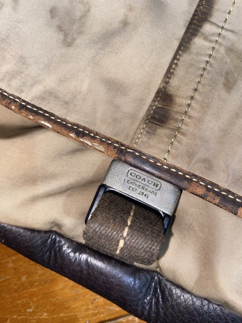 Coach Leatherware Messenger Bag Est. 1941 (Category: Luxury Bags & Wallets) located in Manila. Submitted by nicolezald25729 (Listing ID 1447170497, Image 2). Description: - Classic Coach messenger bag - Tan canvas and dark brown leather - Adjustable strap with buckle closure - Interior zip pocket - Visible stains and wear on canvas - Features classic Coach hardware -Ykk - Ideal for everyday use Need’s special cleaning 🧼 P1000.