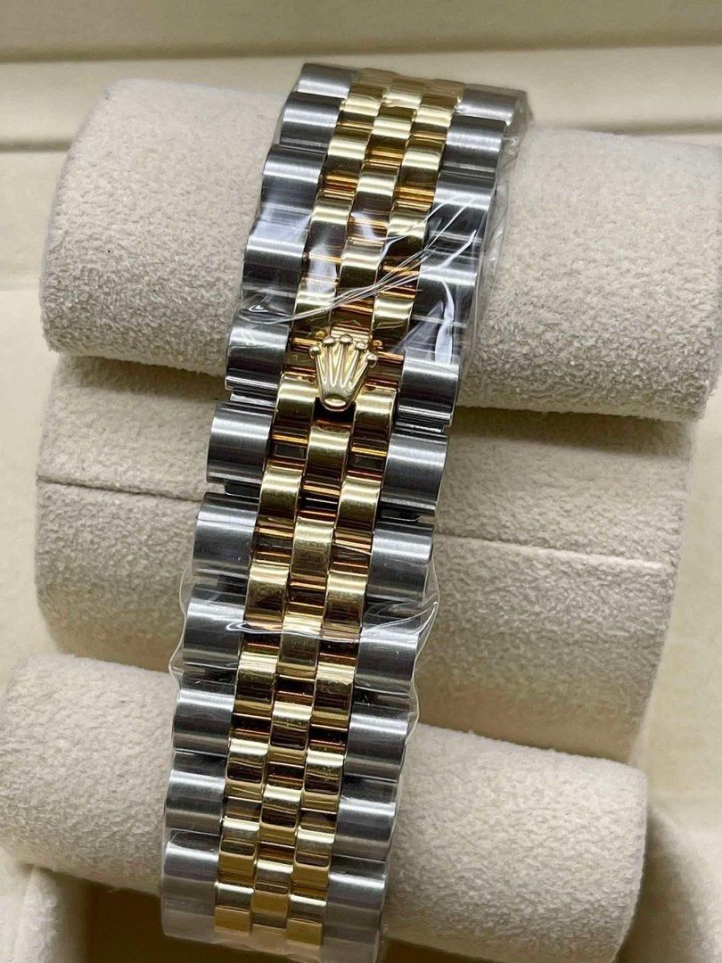 DATEJUST 36 ROMAN MOP TWO TONE YG. (Category: Luxury Watches) located in Manila. Submitted by watchesbyjamesdy (Listing ID 1447187521, Image 3). Description: - Authentic Rolex Oyster Perpetual Datejust - Two-tone: Stainless Steel and 18k Yellow Gold - Stunning Mother of Pearl dial with elegant Roman numerals - Classic fluted bezel - Comfortable and iconic Jubilee bracelet - Date window at 3 o'clock - Superlative Chronometer Officially Certified f
