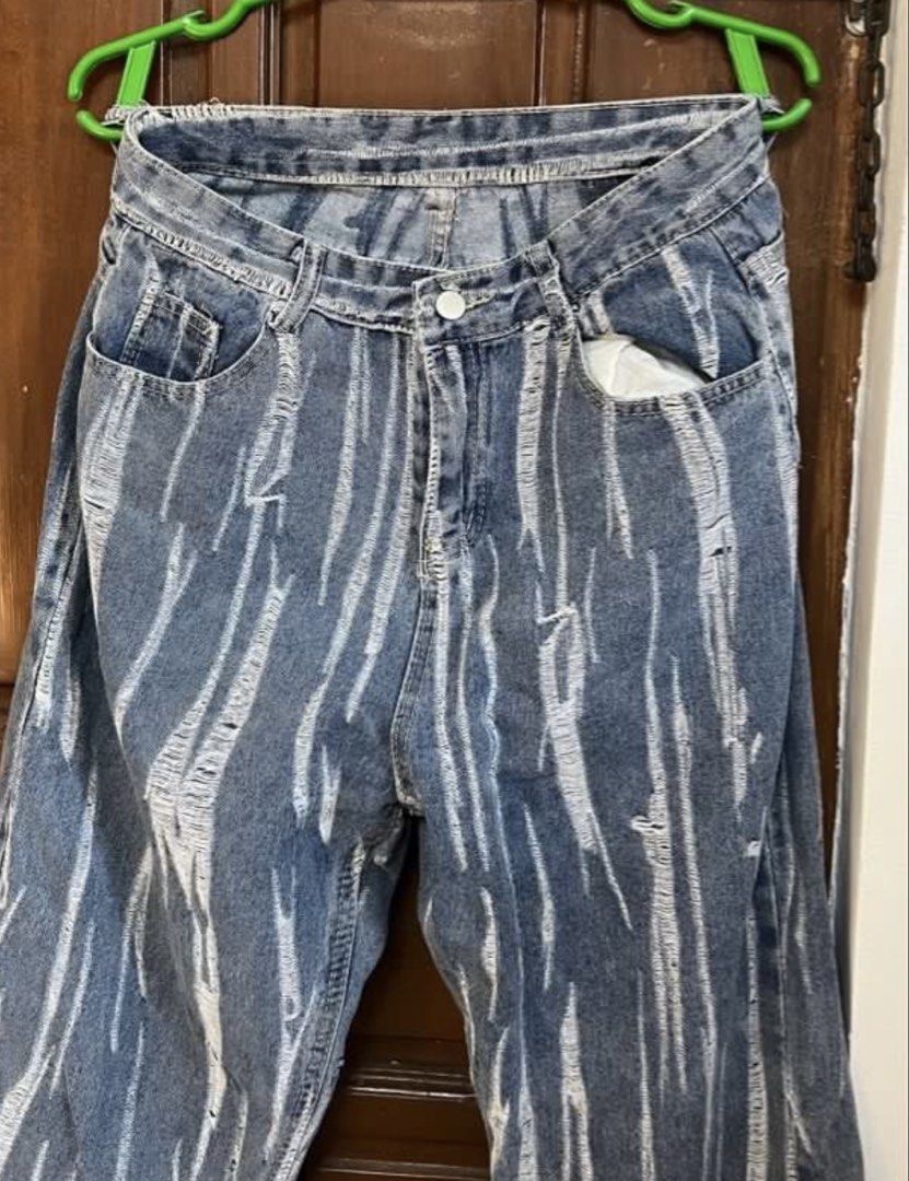 Denim High Waist Baggy Jeans with Unique Pattern (Category: Jeans) located in Cebu City. Submitted by lucypim (Listing ID 1447195221, Image 2). Description: - High waist baggy jeans - Size: M (EU 38) - Best fit for waist: 29-31 inches - Features a cool distressed pattern (no rips or tears) - Ideal for an edgy, casual style - Unique addition to your wardrobe.