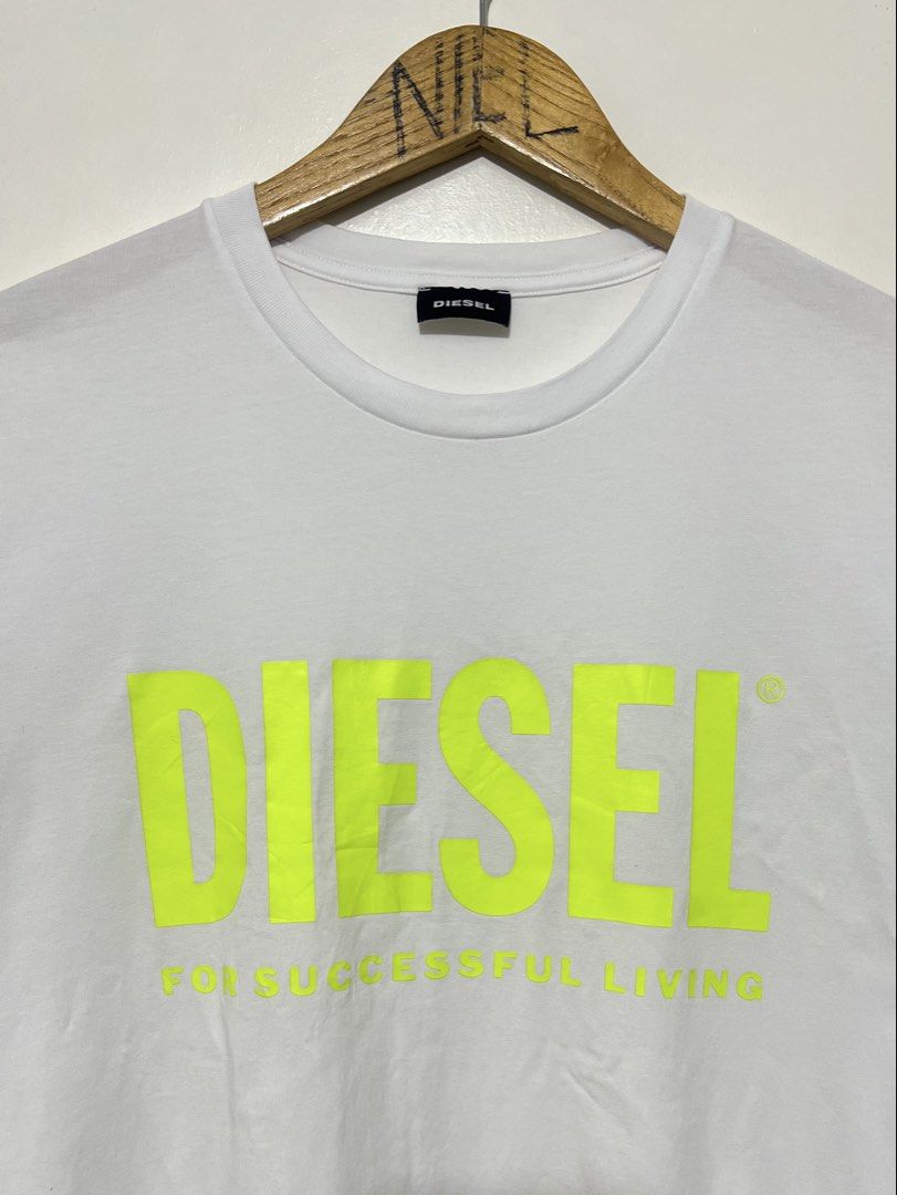 Diesel White T Shirt (Category: Tshirts & Polo Shirts ) located in Bacolod City. Submitted by thriftppy_ (Listing ID 1447276635, Image 3). Description: Size Large Width: 20.5 Length: 28 Color rate: 10/10 Condition: Excellent near new Issue: none DM for sure buyers 📥 Mode of payment:GCASH, BANK TRANSFER Unli vouch and vc for safety transaction. 📌Color may vary due to lighting📸 📦 Shipping via JNT EXPRESS🚚 📍Location: Bacolod City, Negros Occid
