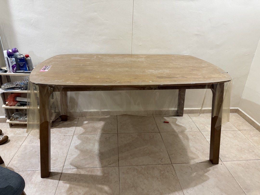 Dining Table (Category: Tables & Sets) located in Singapore. Submitted by szulll (Listing ID 1447193744, Image 1). Description: Length: 150cm Width: 90cm Height: 75cm Only wooden dining table, can fit up to 4 chairs. Can arrange for self pickup/delivery. .