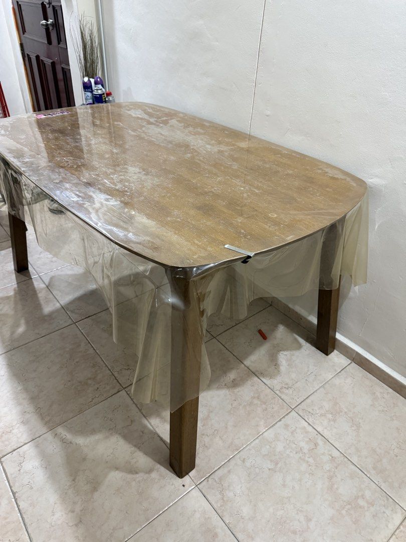 Dining Table (Category: Tables & Sets) located in Singapore. Submitted by szulll (Listing ID 1447193744, Image 3). Description: Length: 150cm Width: 90cm Height: 75cm Only wooden dining table, can fit up to 4 chairs. Can arrange for self pickup/delivery. .