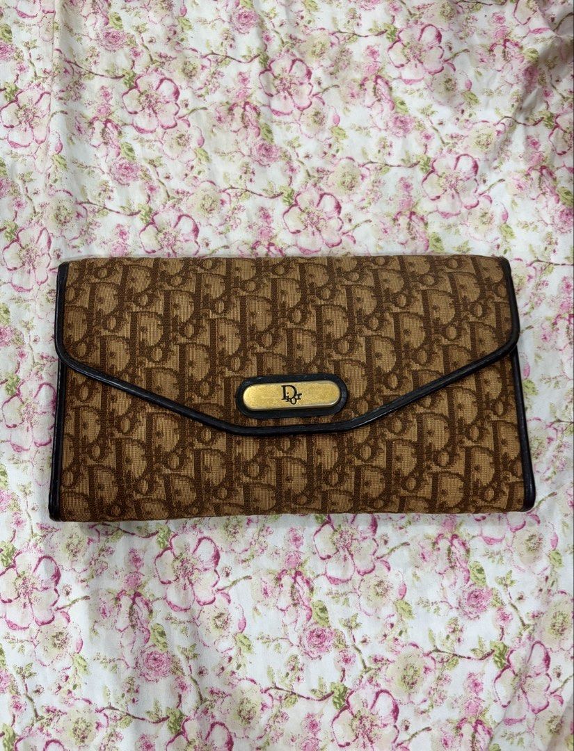 Dior Trotter Monogram Clutch (Category: Luxury Bags & Wallets) located in Iba. Submitted by luxbagsandblings (Listing ID 1447271167, Image 1). Description: 🌸Guaranteed Authentic Christian Dior Trotter Monogram Print Clutch Bag 💯 -Vintage Model (Late 1990’s) (Check photos) Just add a Chain and it can be worn as a Shoulder Bag or Crossbody Bag. -Slightly Negotiable -RANK B✨(Minor issues only. Snap Button lock has been changed, I had it changed la