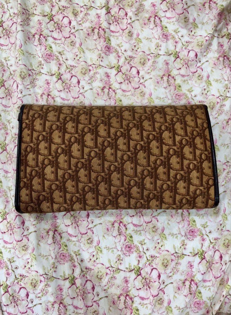 Dior Trotter Monogram Clutch (Category: Luxury Bags & Wallets) located in Iba. Submitted by luxbagsandblings (Listing ID 1447271167, Image 2). Description: 🌸Guaranteed Authentic Christian Dior Trotter Monogram Print Clutch Bag 💯 -Vintage Model (Late 1990’s) (Check photos) Just add a Chain and it can be worn as a Shoulder Bag or Crossbody Bag. -Slightly Negotiable -RANK B✨(Minor issues only. Snap Button lock has been changed, I had it changed la