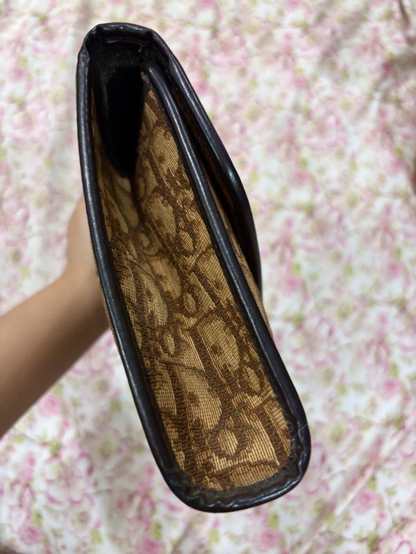Dior Trotter Monogram Clutch (Category: Luxury Bags & Wallets) located in Iba. Submitted by luxbagsandblings (Listing ID 1447271167, Image 3). Description: 🌸Guaranteed Authentic Christian Dior Trotter Monogram Print Clutch Bag 💯 -Vintage Model (Late 1990’s) (Check photos) Just add a Chain and it can be worn as a Shoulder Bag or Crossbody Bag. -Slightly Negotiable -RANK B✨(Minor issues only. Snap Button lock has been changed, I had it changed la