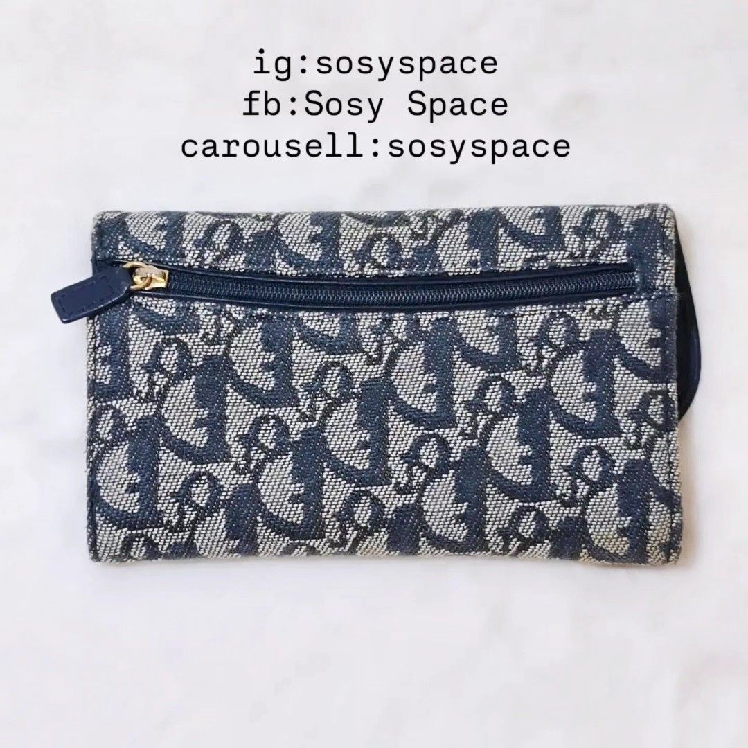 Dior Trotter Saddle Trifold Wallet (Category: Luxury Bags & Wallets) located in Lucena. Submitted by sosyspace (Listing ID 1447173069, Image 2). Description: D. I. O. R. 03B2P3 Trotter Saddle Tri-fold Wallet Navy Blue Oblique Jacquard Monogram Canvas Gold Tone D charm Spain 17x2.5x10cm Includes: Authenticity Card Condition: PRELOVED In excellent condition for me with signs of use of course minor oxidation just send to a spa to look like new Price