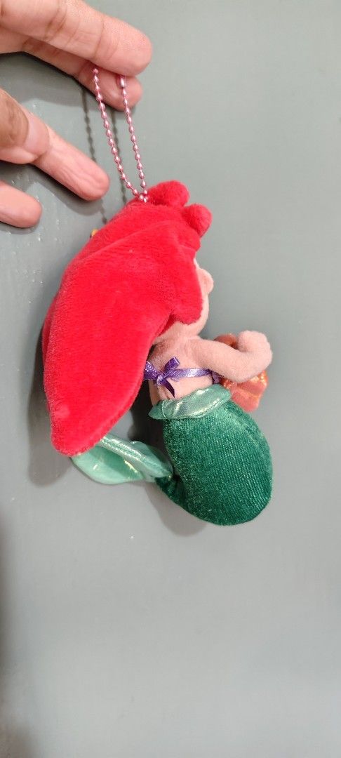 Disney Ariel Mermaid Plush Keychain (Category: Plushies & Soft Toys) located in Caloocan City. Submitted by rsha31 (Listing ID 1447138466, Image 2). Description: - Adorable Ariel plush keychain - Features her iconic seashell top and green tail - Includes a charming pearl detail - Perfect accessory for bags or keys - Great gift for any Disney enthusiast.