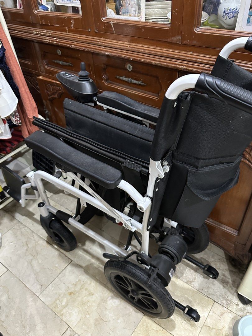 Electric Wheelchair with Joystick Control (Category: Wheelchairs) located in Manila. Submitted by snupi (Listing ID 1447113599, Image 2). Description: - Electric wheelchair for sale - Easy maneuverability with joystick control - Comfortable black seat and backrest - Stylish white frame - Durable black wheels - Minor signs of use, excellent working condition - Ready for its new owner * Net Weight: 28 kg * Max load: 100 kg * Motor: 500 W * Top spee