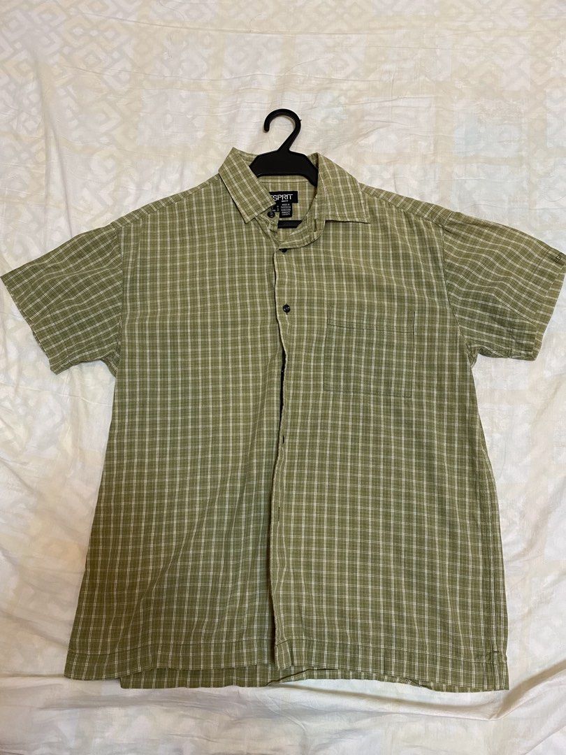 Esprit Men's Green Short-Sleeve Plaid Button-Down (Category: Tshirts & Polo Shirts ) located in Taguig. Submitted by ayo.pie (Listing ID 1447171058, Image 1). Description: - Espirit Men Short-Sleeve Plaid Button-Down (Second hand) - Olive Green - M / EU 50 / UK 40 / US 40 RFS: Decluttering Original price: ₱2,000 Selling for: ₱900 (negotiable) - Authentic - Condition: Like new, barely worn, no fading, no damage - Chest pocket - Made in Hong Kong -
