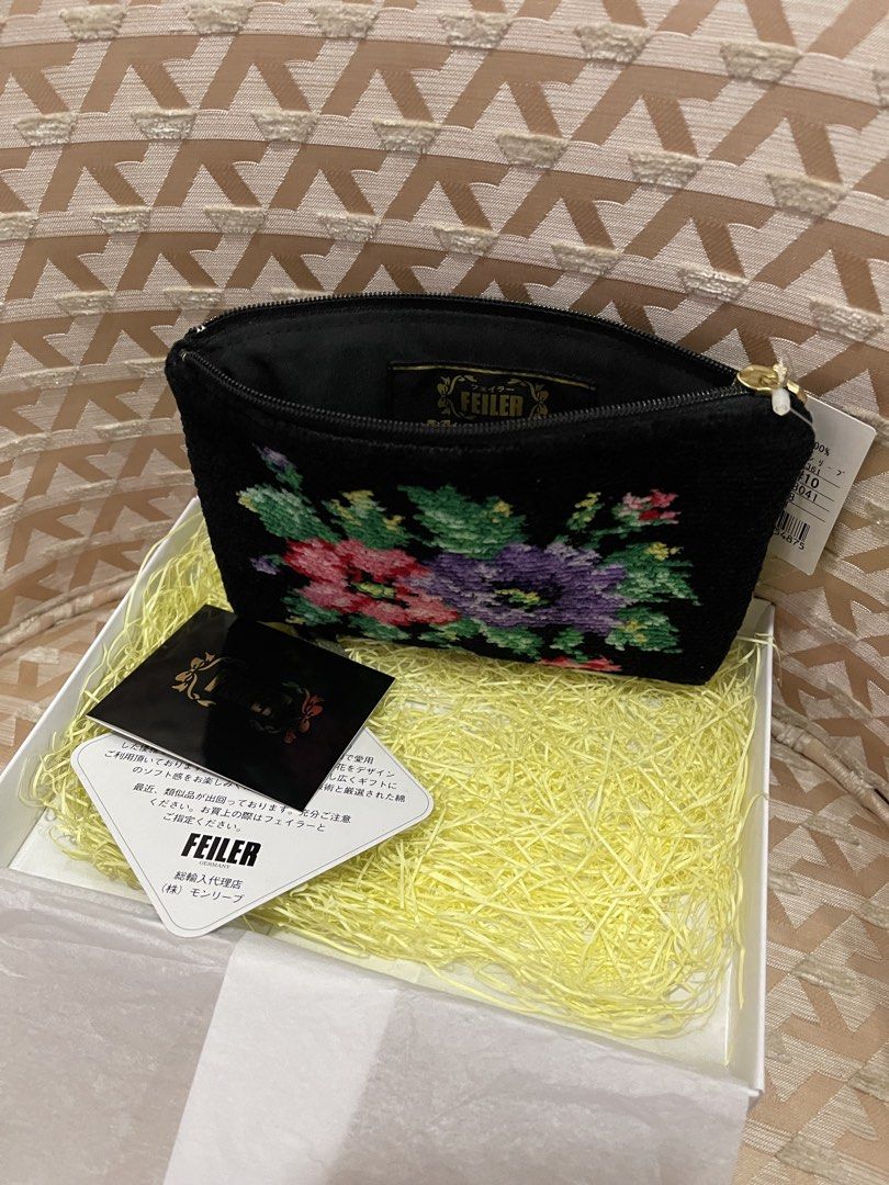 Feiler Germany Black Floral Embroidered Pouch (Category: Purses & Pouches) located in Davao. Submitted by giftopia (Listing ID 1447192989, Image 3). Description: Cute Feiler pouch with floral embroidery. Black with pink, purple, green flowers. Zipper closure. Comes with tags & box. Perfect for small essentials..
