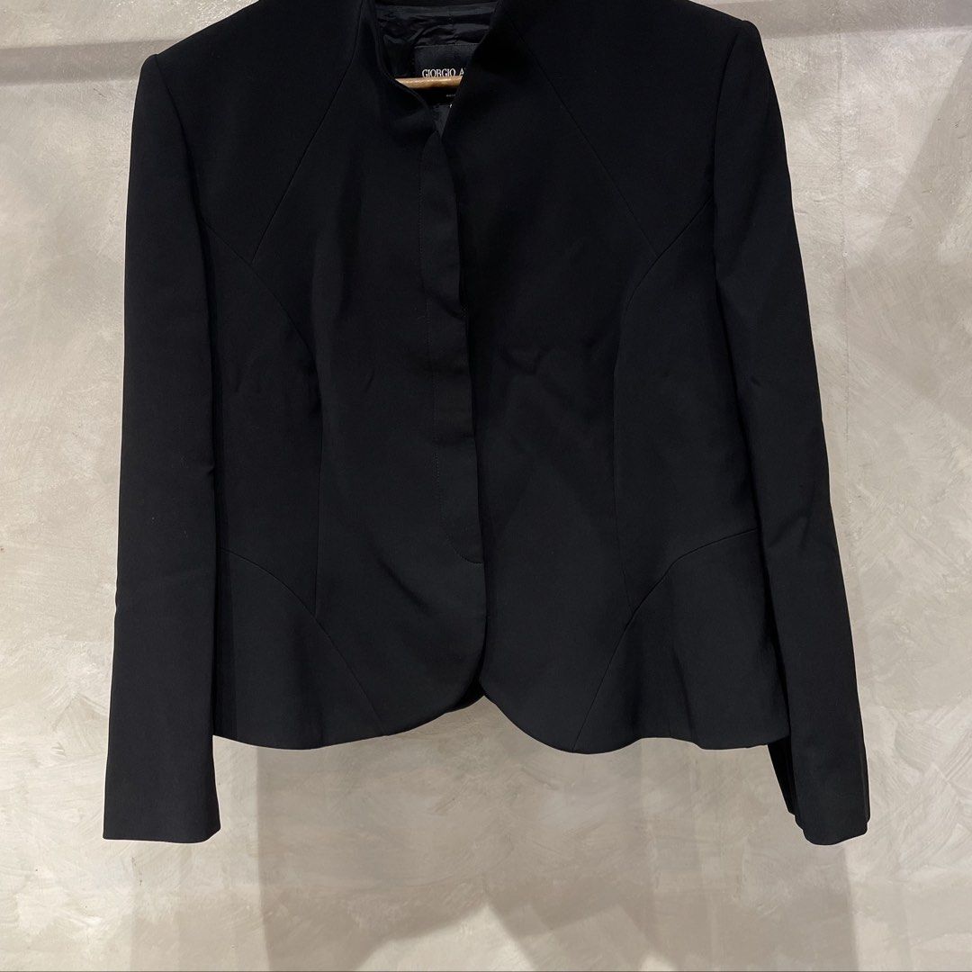 Giorgio Armani Mandarin Style Blazer (Category: Coats, Jackets and Outerwear) located in Manila. Submitted by walter_wt (Listing ID 1447214386, Image 2). Description: Giorgio Armani Mandarin Style Blazer Tagged size- 48 Dimension- Length- 24 Width-20 Sleeve length- 22 No issue. This black Giorgio Armani jacket features a sophisticated, minimalist silhouette characterized by its structured shoulders, high stand collar, and a concealed front closur