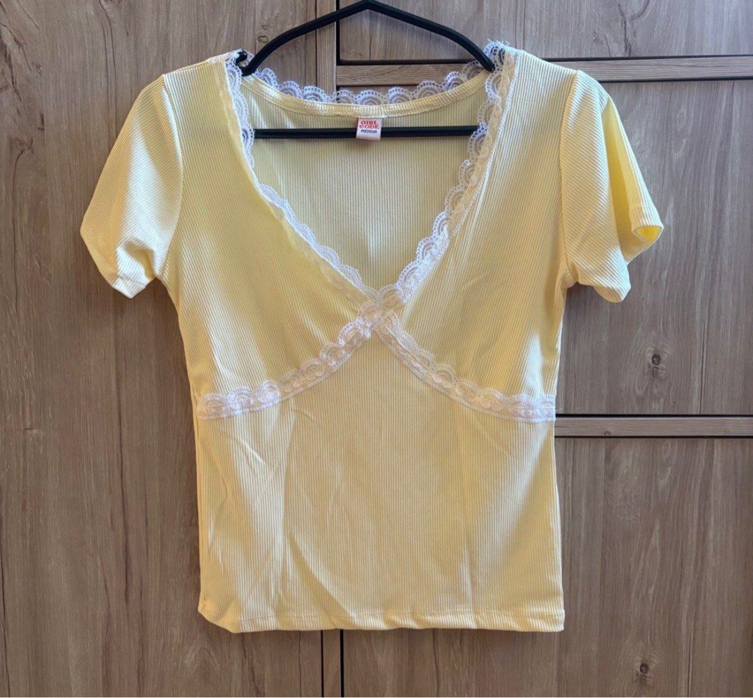 Girl Code Yellow Lace Trim V-Neck Ribbed Top (Category: Sleeveless) located in Silang. Submitted by declutterswuni (Listing ID 1447207983, Image 2). Description: - also available in light pink and maroon (both size small) - Cute yellow top from Girl Code - V-neck with white lace trim - Ribbed texture all over - Short sleeves .