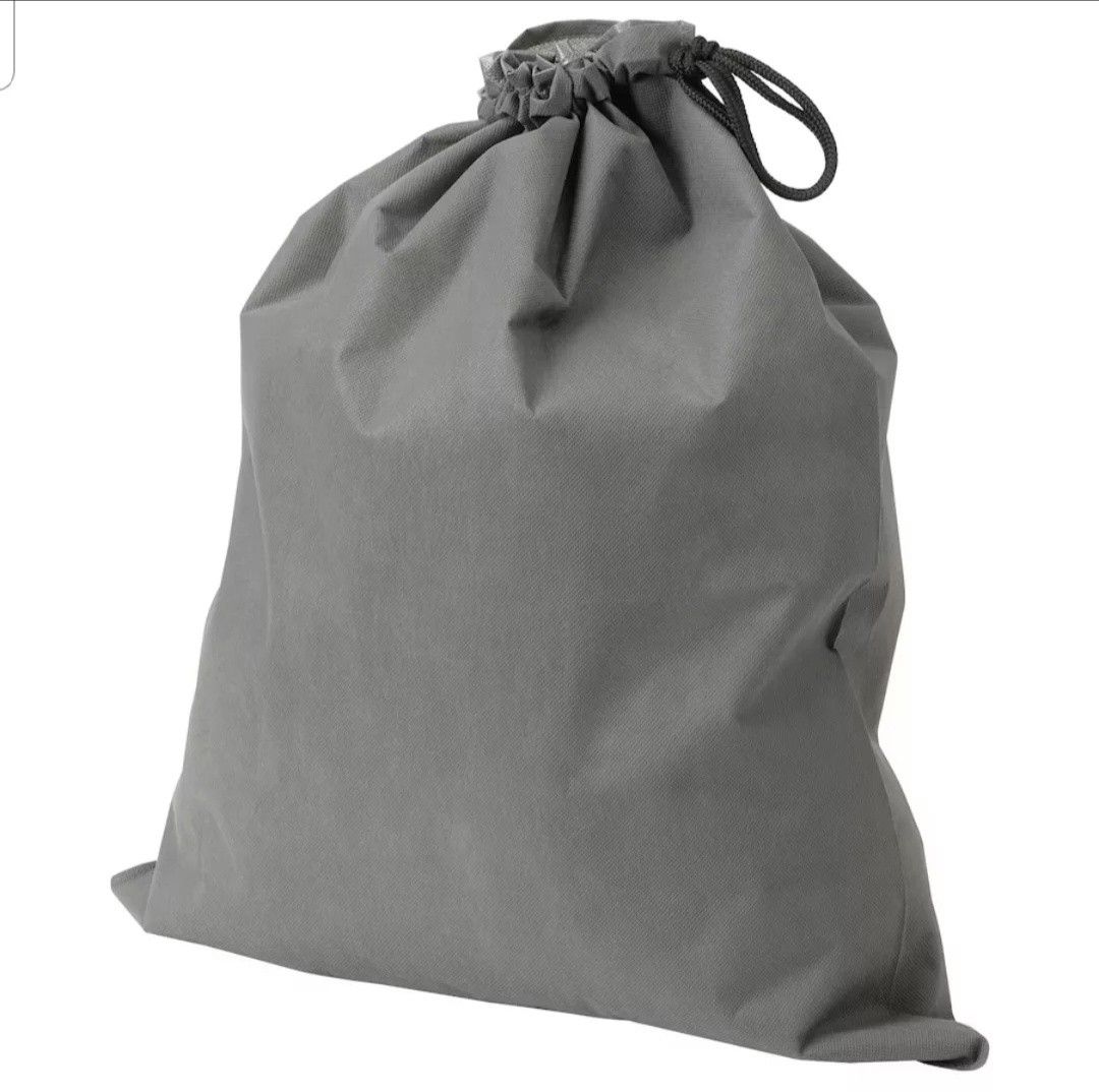 Grey Drawstring Storage Bag (Category: Storage Boxes & Baskets) located in Makati City. Submitted by shopaholicsgallery (Listing ID 1447212554, Image 3). Description: - IKEA grey drawstring storage bag - Ideal for organizing clothes, toys, and household items - Made of durable fabric - Folds flat for convenient storage - Keeps closets and shelves tidy - Easy drawstring closure - Brand: IKEA.