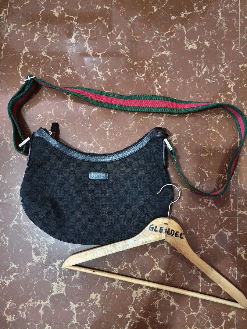 Gucci GG Monogram Canvas Shoulder Bag with Web Stripe (Category: Luxury Bags & Wallets) located in Paranaque City. Submitted by glendel_04 (Listing ID 1447110812, Image 1). Description: Good cond 9.8/10 All details dyan na po Preloved .