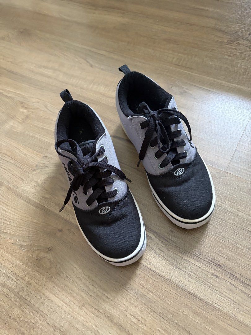 Heelys Roller Shoes Black Grey (Category: Sneakers) located in Pasig City. Submitted by isaselle (Listing ID 1447164865, Image 1). Description: Rfs - i give up 😭😭😭 - Heelys roller shoes - Color: Black and Grey - Size: Youth 5, EUR 38, UK 5, CM 24 - Closure: Lace-up - Feature: Wheels integrated into the soles - Perfect for skating and cruising - Condition: Minor scuffs from normal use.