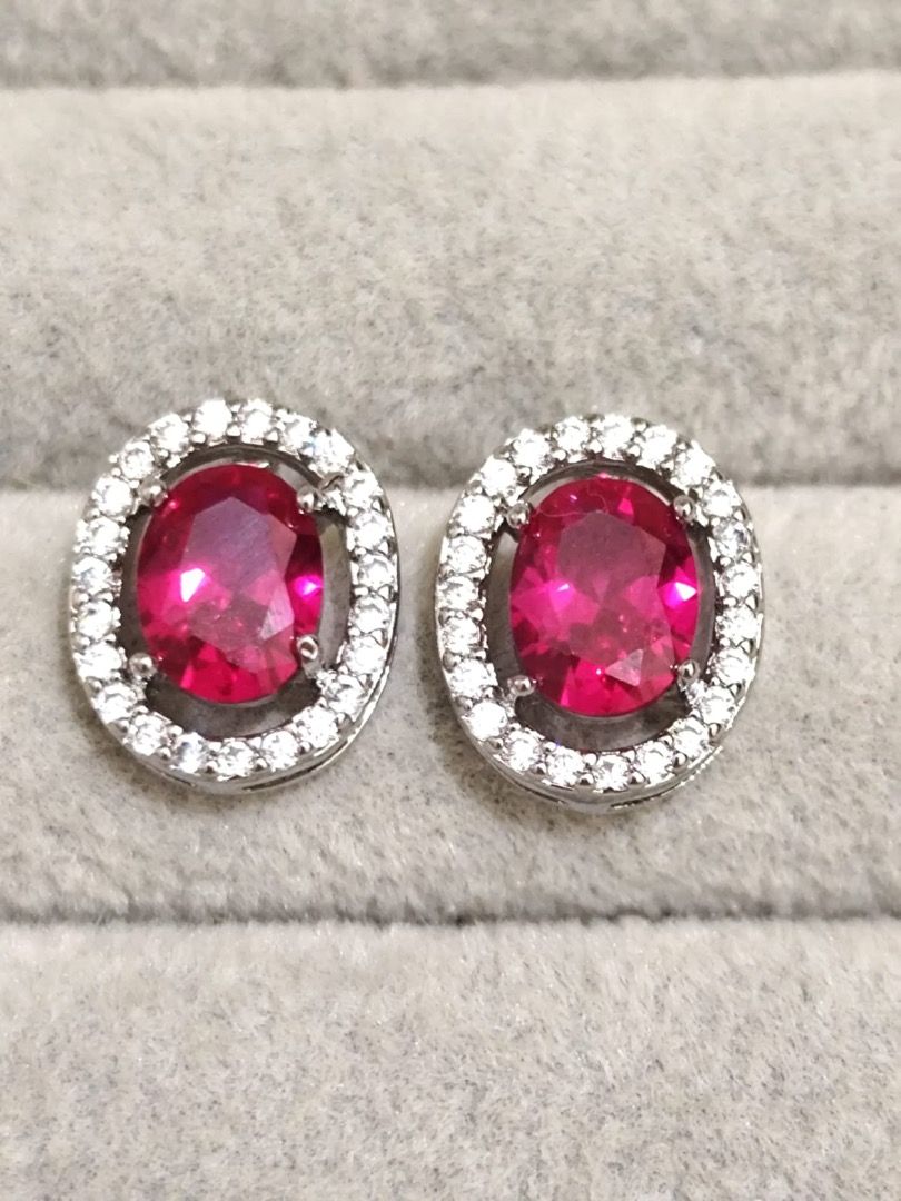HIGH QUALITY 2.50 carat Natural Burmese Ruby Simple Oval Stud Earrings (UV REACTIVE!) (Category: Earrings) located in Mandaluyong City. Submitted by allaboutgemsandco (Listing ID 1447112576, Image 3). Description: HIGH QUALITY 2.50 carat Natural Burmese Ruby Simple Oval Stud Earrings (UV REACTIVE!) Stone Size: 8mmx6.3mm*2 Price: Php 1000 add shipping fee for less than Php 1000 REASON FOR SALE: Clearing out my collection. Stones sourced from from 