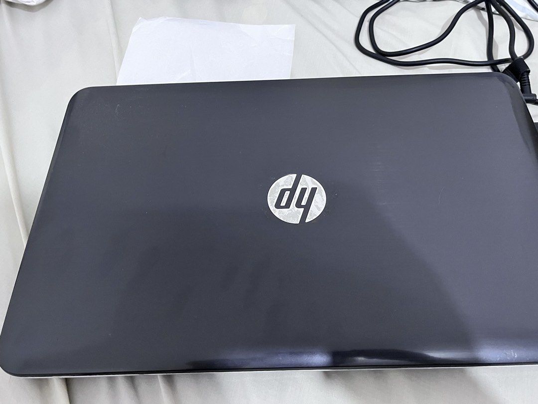 HP Pavilion Laptop (Category: Laptops & Notebooks) located in Cavite. Submitted by jhzoe (Listing ID 1447240035, Image 2). Description: - HP Pavilion Laptop - Sleek Black Exterior with HP Logo - Full Keyboard with Numeric Keypad - Enhanced Audio with DTS Sound+ - Screen Date: 10/21/2025 - Includes Power Adapter - Ready for its New Owner!.