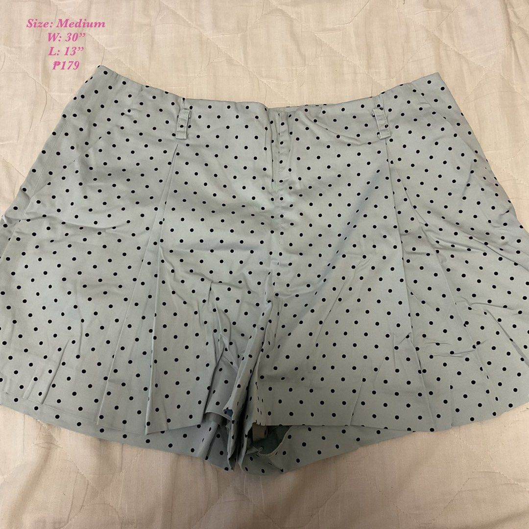 iROO Light Blue Polka Dot Pleated shorts Size Medium (Category: Shorts) located in Las Pinas. Submitted by jhoyiii (Listing ID 1447226412, Image 1). Description: - Light blue shorts with black polka dots - Pleated front detail - Zipper closure at the front - Size: Medium - Waist: 30 inches - Length: 13 inches - Ideal for casual wear.