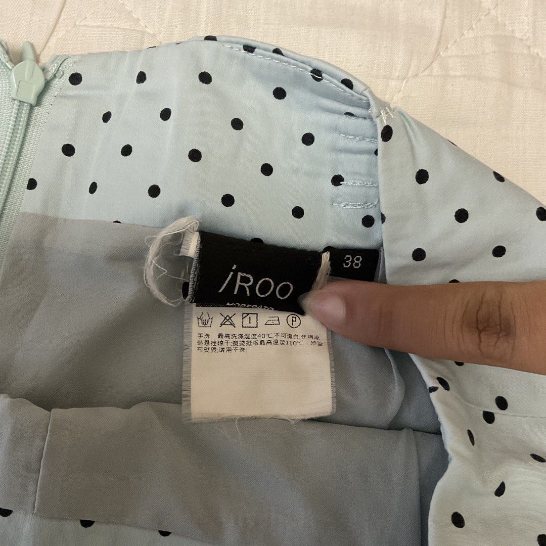 iROO Light Blue Polka Dot Pleated shorts Size Medium (Category: Shorts) located in Las Pinas. Submitted by jhoyiii (Listing ID 1447226412, Image 2). Description: - Light blue shorts with black polka dots - Pleated front detail - Zipper closure at the front - Size: Medium - Waist: 30 inches - Length: 13 inches - Ideal for casual wear.