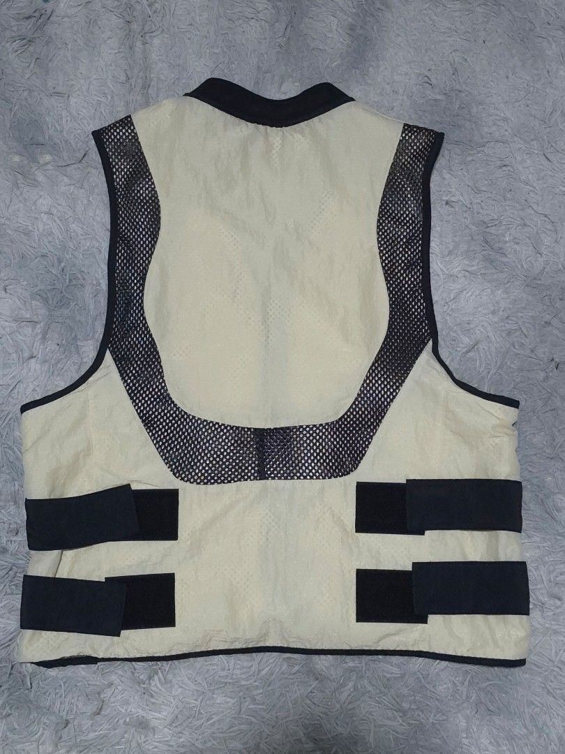 Jordan Utility Vest Tan Black Mesh Pockets (Category: Vests) located in Abulug. Submitted by humanwhosellthings (Listing ID 1447232108, Image 2). Description: - Jordan utility vest in tan and black. - 20W x 23L - Like New Condition - Cut washtag lang issue - Features multiple pockets, some with mesh detailing. - Zipper closure for secure fit. - Ideal for ample storage and adding a stylish element to your outfit. - Perfect for layering over other 