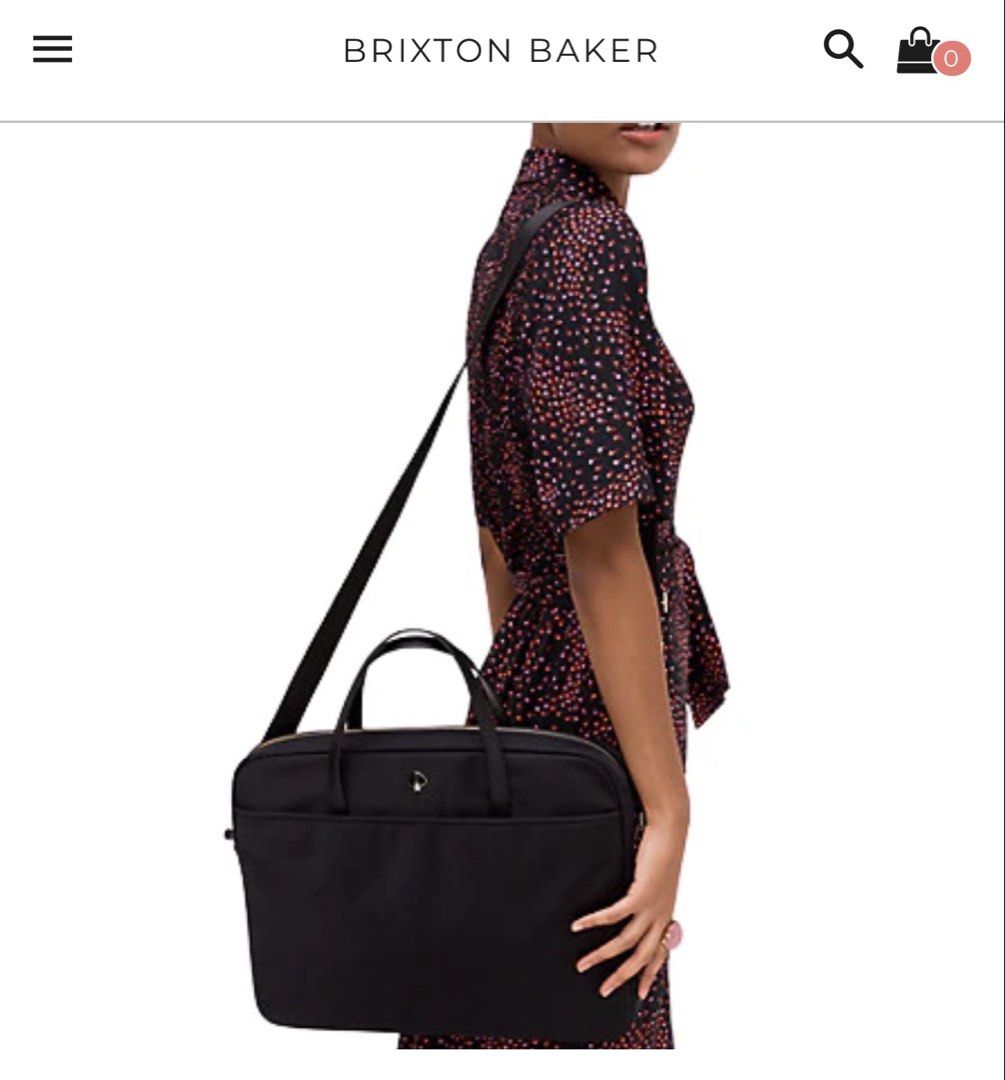 Kate Spade Black Laptop Bag (Category: Laptop Bags & Sleeves) located in Mandaluyong City. Submitted by 1hapimaki (Listing ID 1395028478, Image 1). Description: - Black laptop bag - Includes a shoulder strap and top handles - Main compartment with multiple pockets - Zipper closure - Silver-tone hardware - Made of a nylon-like material - Interior tag present.