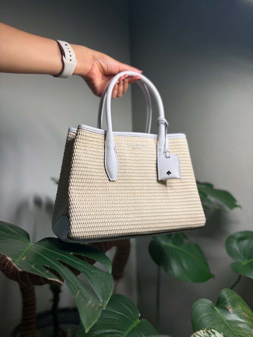 Kate Spade Eva Satchel (Category: Luxury Bags & Wallets) located in Bulacan. Submitted by lenggayy (Listing ID 1447224010, Image 2). Description: - Cute straw bag - Light blue leather accents - Top handle design - Small Kate Spade tag attached - Ideal for summer outings - Fits essentials.
