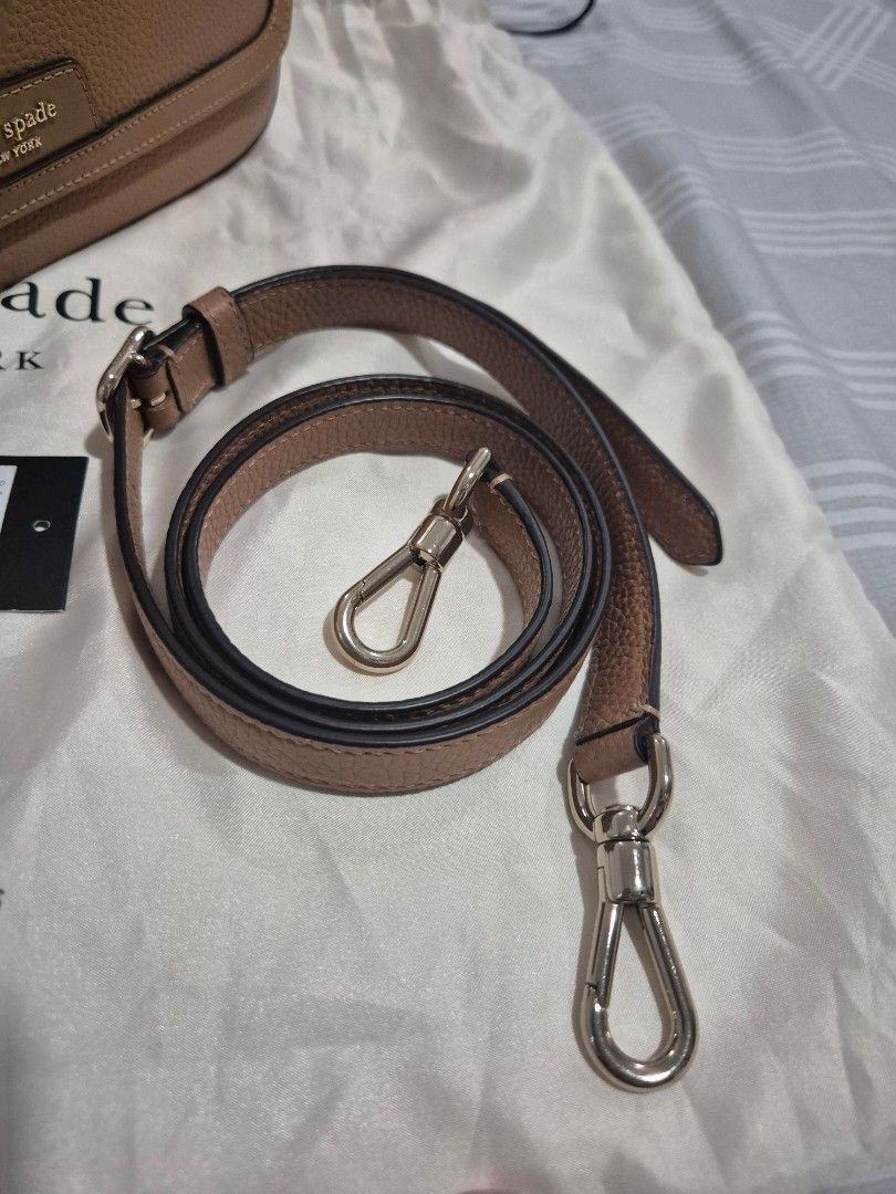 Kate Spade Hudson Convertible Shoulder (Category: Cross-body Bags) located in Manila. Submitted by kimfl (Listing ID 1447249139, Image 3). Description: - Brand: Kate Spade New York - Material: Brown pebble leather - Style: Crossbody bag - Features: Adjustable strap, original tag attached - Includes: Dust bag - RFS: Decluttering .