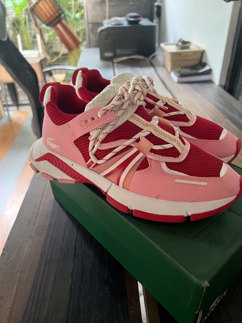 Lacoste L001 0321 SFA Sneakers (Category: Activewear) located in Pasay City. Submitted by karlamarithe (Listing ID 1447212310, Image 3). Description: Lacoste L001 0321 SFA Sneakers 💗 Brand New with Original Box 📏 Women’s US 6.5 Selling this beautiful Lacoste L001 0321 SFA sneakers in a vibrant pink/red colorway. Features a breathable mesh upper with leather overlays, chunky cushioned sole, and signature Lacoste crocodile branding. Stylish, ligh