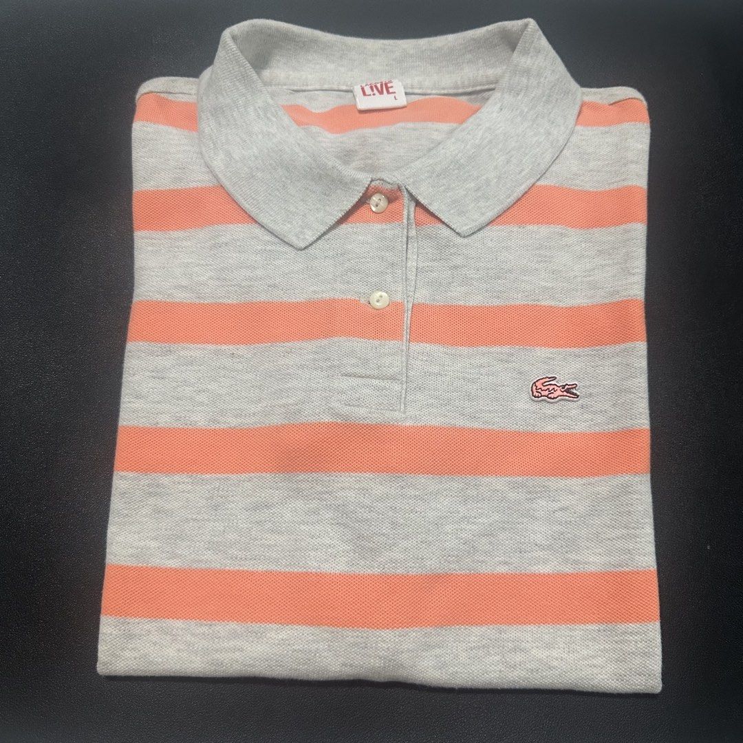 Lacoste Live Striped Polo Shirt (Category: Shirts) located in Quezon City. Submitted by mystash2.o (Listing ID 1447201667, Image 1). Description: - Lacoste Live grey and coral striped polo shirt - Classic crocodile logo on chest - Button-up neckline - Perfect for casual outfits.