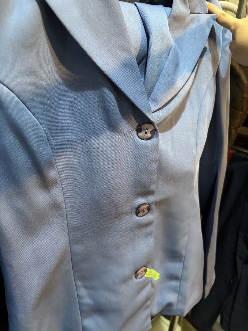 Light Blue Blazer and Skirt Suit Set (Category: Sets or Coordinates) located in Manila. Submitted by hii678 (Listing ID 1447121309, Image 2). Description: - Professional light blue suit set - Includes tailored blazer and knee-length skirt - Blazer features 3 buttons and classic lapel - Skirt has a slit for ease of movement - Ideal for work or formal occasions - Label reads 'Lovely Girl'.