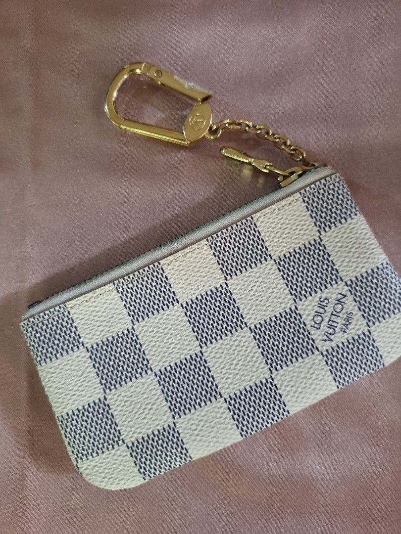 Louis Vuitton Key Pouch Damier Azur Canvas (Category: Luxury Bags & Wallets) located in Manila. Submitted by viviennespreloved22 (Listing ID 1447121593, Image 1). Description: its Authentic bought in Paris There are signs of usage but not abused fixed price no box no return no echange.