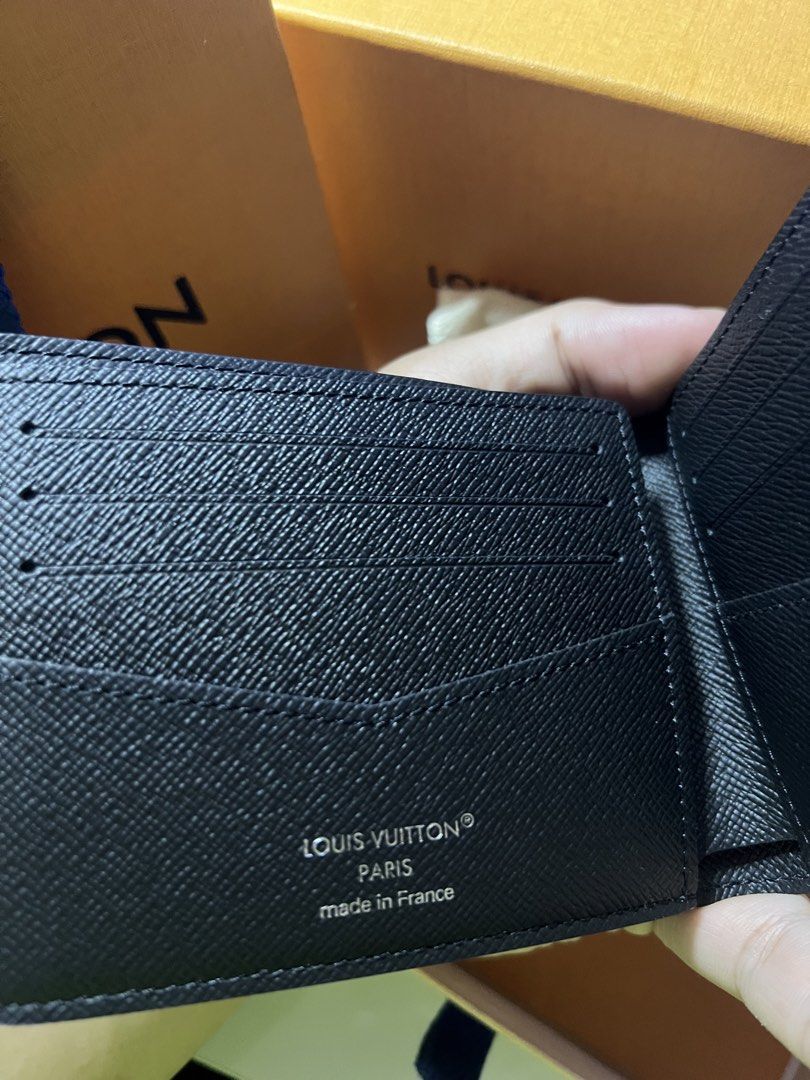 Louis Vuitton Monogram Eclipse Slender Wallet (Category: Luxury Bags & Wallets) located in Antipolo. Submitted by quintessence_ (Listing ID 1447271269, Image 3). Description: Authentic Louis Vuitton Slender Wallet - Monogram Eclipse canvas - Bifold style - Multiple card slots - Comes with paper bag, box, dust bag, and authenticity card - Authenticity also guaranteed thru Entrupy (certificate available upon request) PRICE IS NEGOTIABLE. Payment fi