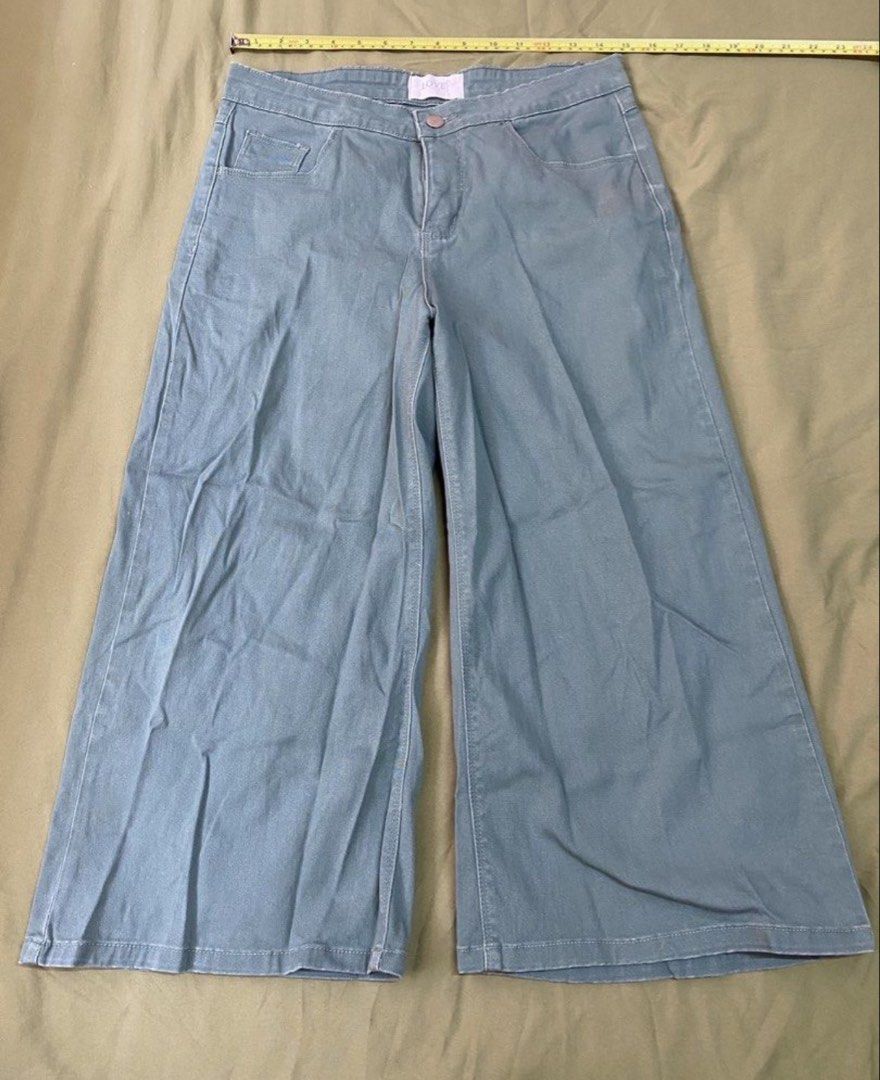 LOVE BAYO Wide Leg Pants (Category: Other Bottoms) located in Cebu City. Submitted by lucypim (Listing ID 1447129865, Image 1). Description: - LOVE BAYO green wide-leg pants - High-waisted design - Button and zip closure - Two front pockets - Two back pockets - Comfortable fabric - Ideal for casual wear.