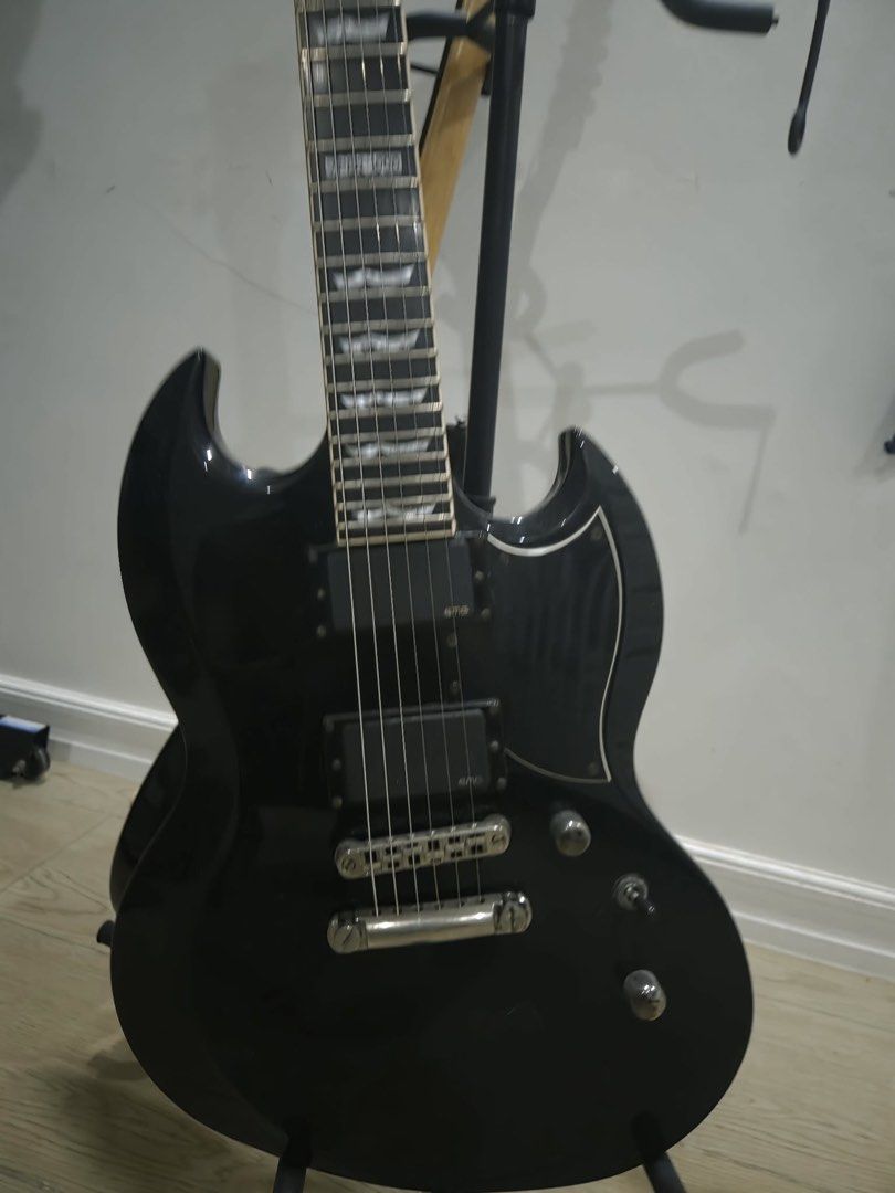 LTD Deluxe Electric Guitar - Black (Category: Musical Instruments) located in San Quintin. Submitted by iloveonlin95673 (Listing ID 1447216883, Image 2). Description: - Black LTD Deluxe electric guitar - SG style body - Minor scuffs on body - Plays well - Ideal for rock and metal music - Selling because it's no longer being played - Ready for a new home Meet up. Bulacan or Pangasinan. .