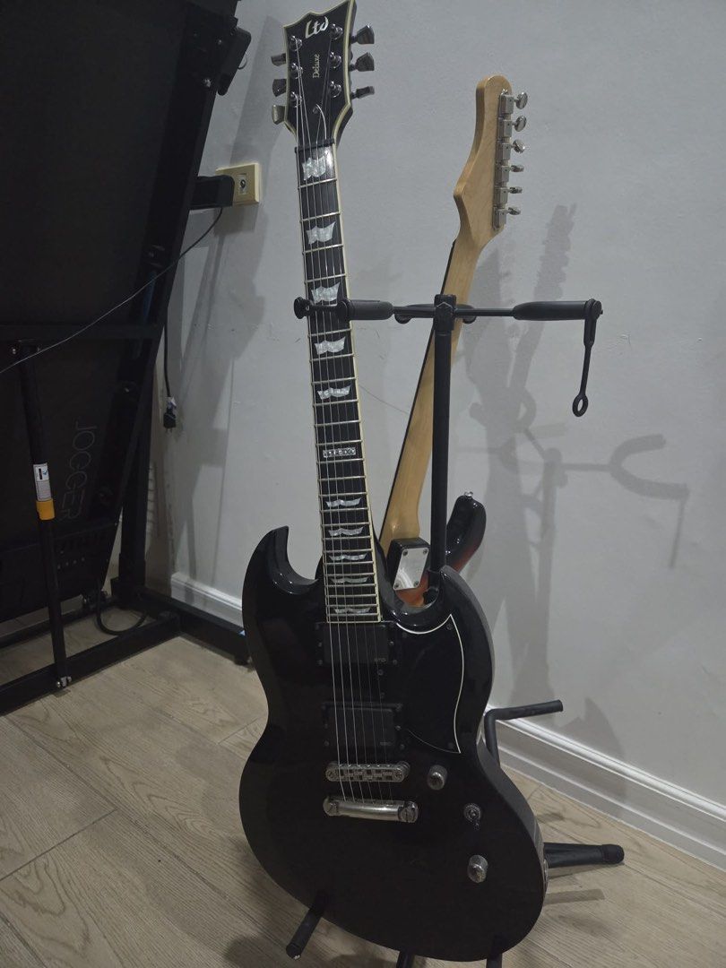 LTD Deluxe Electric Guitar - Black (Category: Musical Instruments) located in San Quintin. Submitted by iloveonlin95673 (Listing ID 1447216883, Image 3). Description: - Black LTD Deluxe electric guitar - SG style body - Minor scuffs on body - Plays well - Ideal for rock and metal music - Selling because it's no longer being played - Ready for a new home Meet up. Bulacan or Pangasinan. .