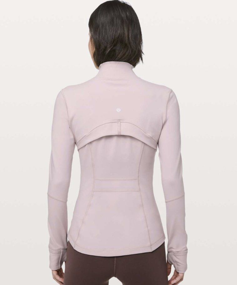 Lululemon Define Jacket Porcelain Pink Size 0 (Category: Activewear) located in Marikina City. Submitted by heyitsmiel (Listing ID 1447237175, Image 2). Description: RFS: I don’t really use it since I’m not that active. Only used twice ☺️ Dm for actual pics! 💓 comes with lululemon eco bag. Got this for 8k Porcelain Pink Lululemon Define Jacket - Features thumbholes at the cuffs - Two convenient zip pockets at the front - Full zip closure for eas