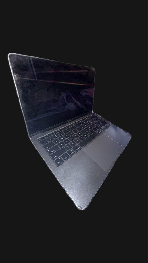 MacBook Air M1 (Category: Laptops & Notebooks) located in Manila. Submitted by truecrystal.009d8e (Listing ID 1447176728, Image 3). Description: RUSH Selling: MacBook Air M1 With dents as seen in picture. Battery health is 73% but with minimal task can last up to 10 hours without charging. NO BOX and NO CHARGER. I already lost the box upon moving out..