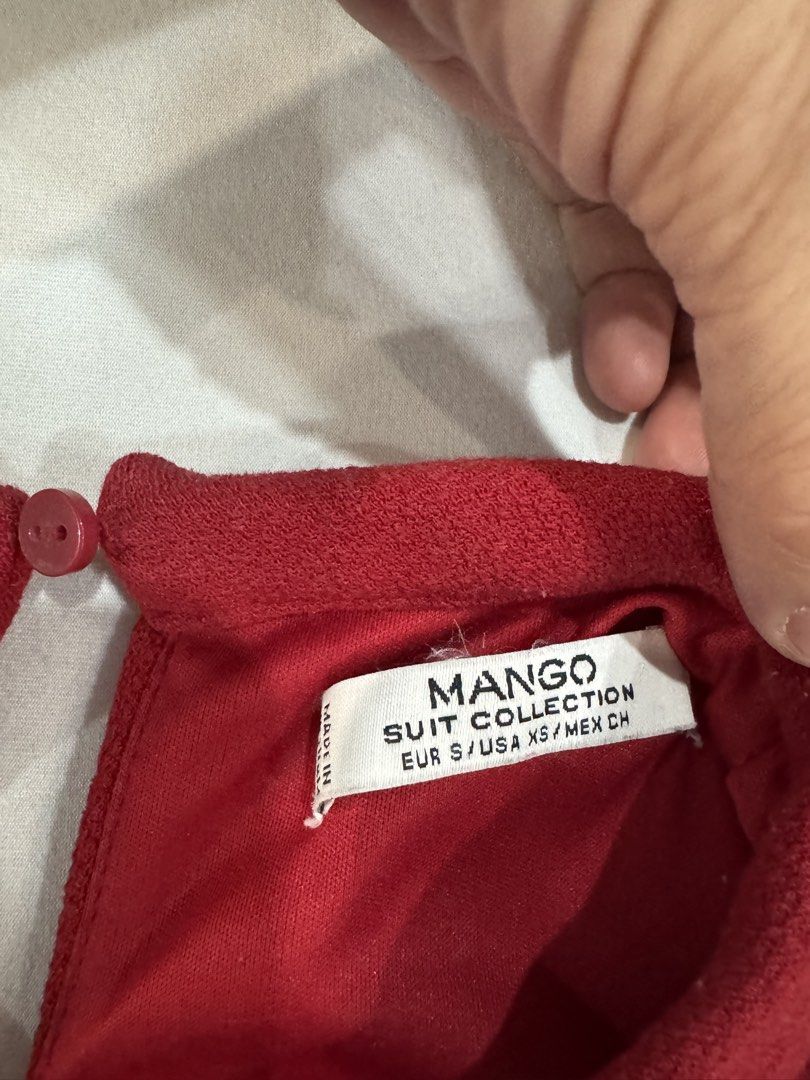 Mango Suit Collection Red Sleeveless Dress (Category: Dresses) located in Batangas. Submitted by sammy0709 (Listing ID 1447269029, Image 2). Description: - Mango Suit Collection sleeveless dress - Size XS - High neckline with keyhole detail at the back - Simple shift silhouette - Perfect for dressing up or down.