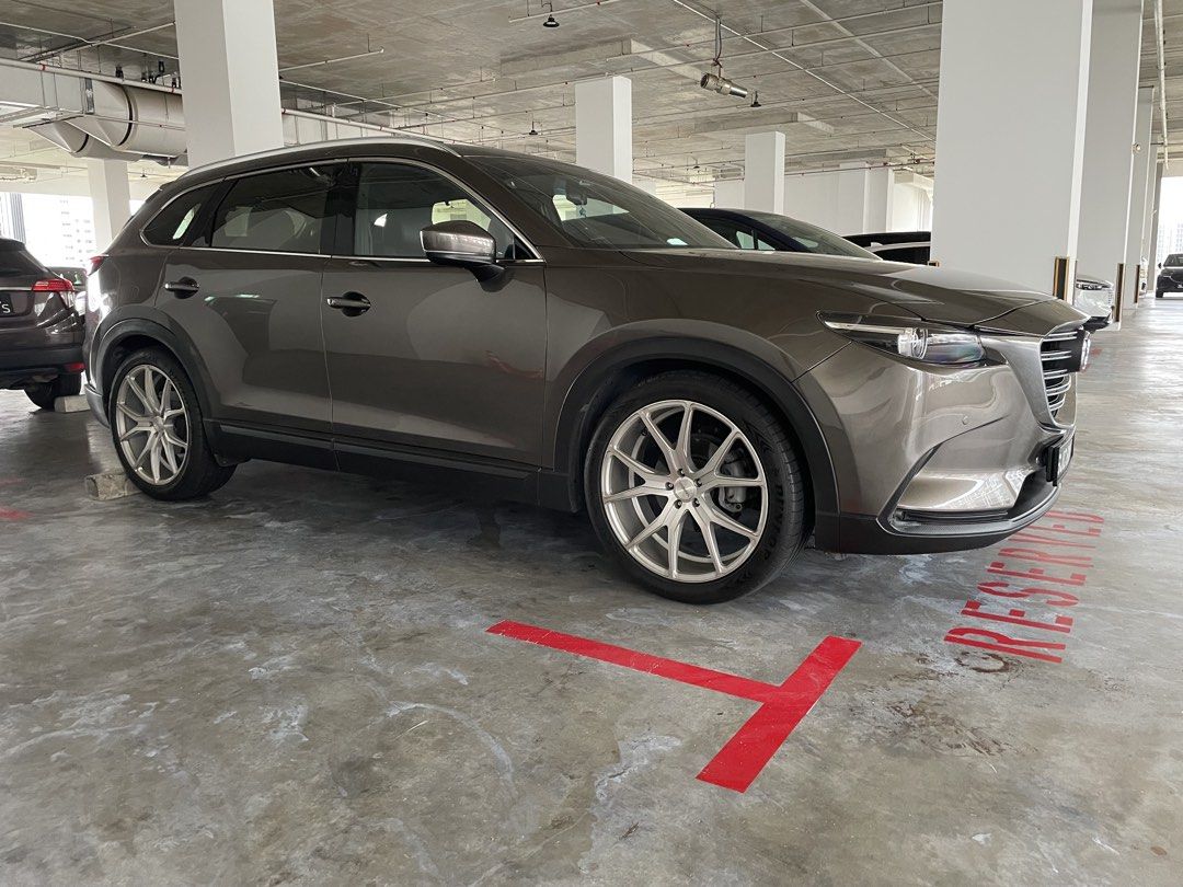 Mazda CX-9 2.5 2WD Turbo Luxury 7-Seater (A) (Category: Used Cars) located in Singapore. Submitted by brickecempire (Listing ID 1446497782, Image 2). Description: Selling a well-maintained and under utilised Mazda CX-9 7-Seater SUV in the elegant Titanium Grey. A comfortable and powerful family SUV that has been properly cared for, with regular servicing and replacement of original parts carried out with records available. • Excellent overall con