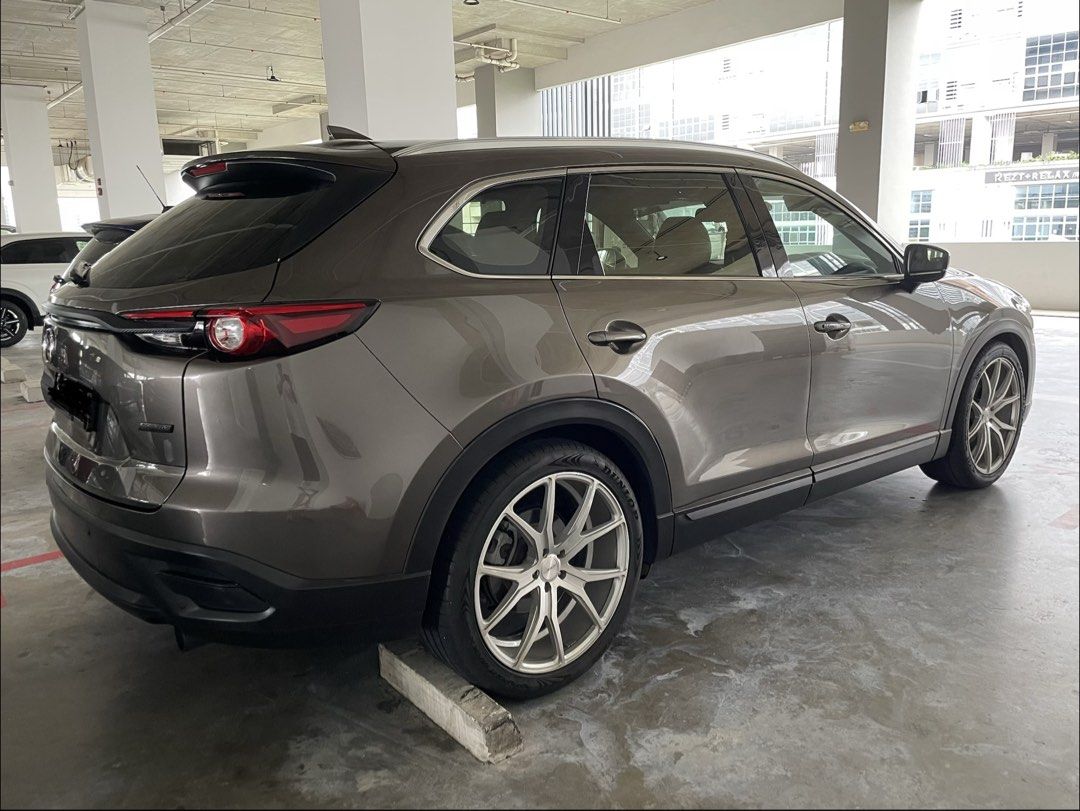 Mazda CX-9 2.5 2WD Turbo Luxury 7-Seater (A) (Category: Used Cars) located in Singapore. Submitted by brickecempire (Listing ID 1446497782, Image 3). Description: Selling a well-maintained and under utilised Mazda CX-9 7-Seater SUV in the elegant Titanium Grey. A comfortable and powerful family SUV that has been properly cared for, with regular servicing and replacement of original parts carried out with records available. • Excellent overall con