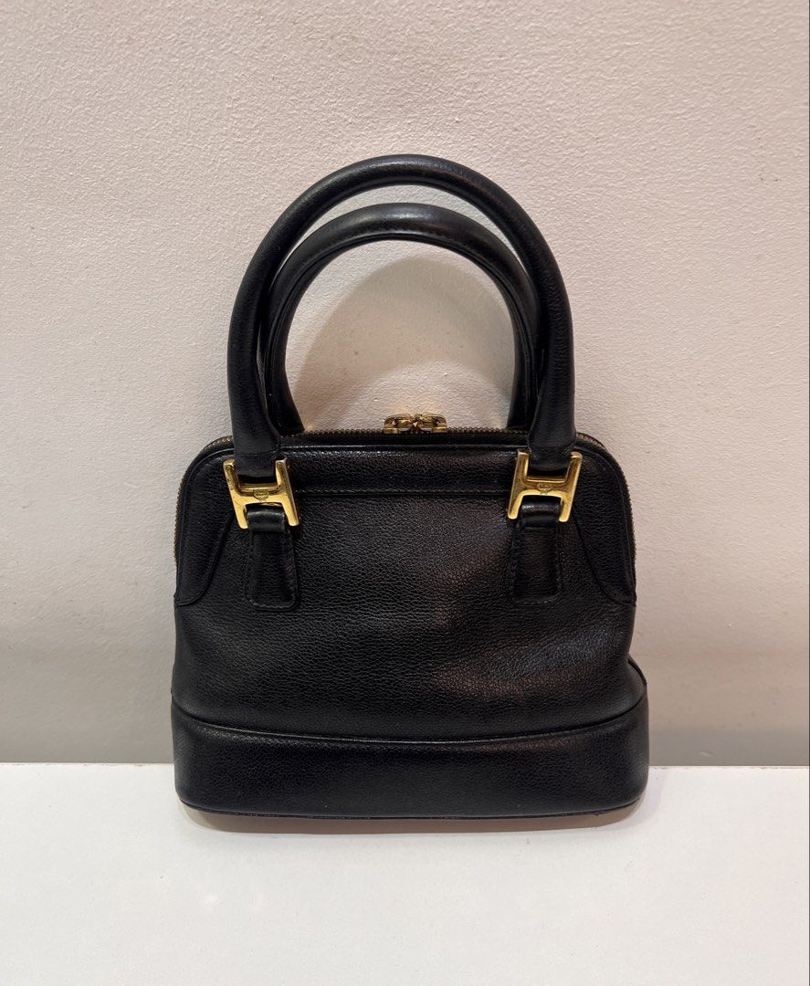 MCM Small Handbag (Category: Luxury Bags & Wallets) located in Cebu City. Submitted by brandedcorner_ph (Listing ID 1447107277, Image 2). Description: Pre-loved (M)(C)(M) Small Handbag 100% Authentic or money back Condition • Excellent condition • No flaws Product Details •Color: Black •Hardware: Gold tone •Material: Leather •Approximate Dimensions in inches: H6.5 x W8.5 x D4 Color may vary due to lighting. PM for more photos 🏷️ 5,800 php •New m