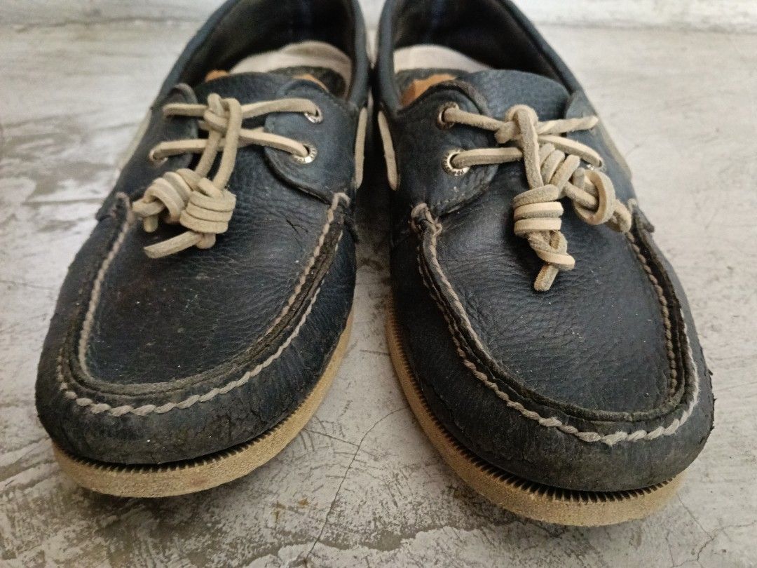 Navy Blue Leather Sperry Boat Shoes (Category: Casual Shoes) located in Paranaque City. Submitted by 27rcd (Listing ID 1447202745, Image 1). Description: Classic navy blue leather boat shoes. These have a traditional lace-up design and a rubber sole. Good for casual wear. Some signs of wear on the leather and soles. Still have plenty of life left in them. Ready for a new owner..