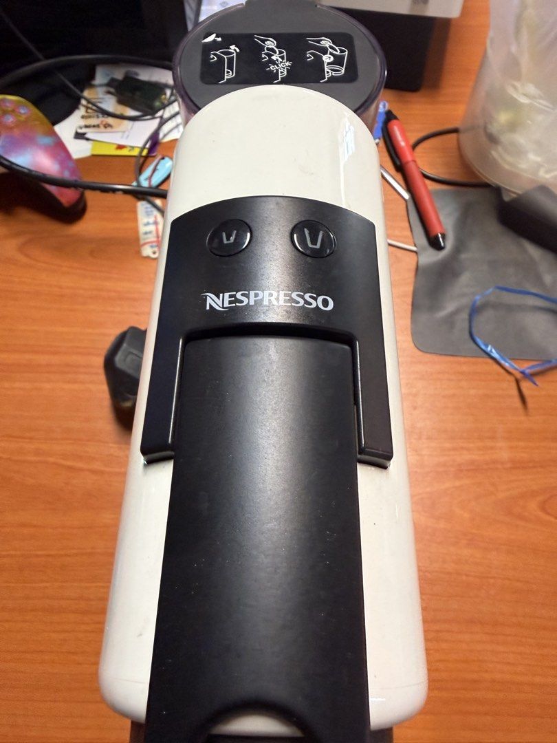 Nespresso Essenzza White (Category: Coffee Machines & Makers) located in Cheras. Submitted by trojandan18 (Listing ID 1447170050, Image 2). Description: - White Nespresso coffee machine - Compact and easy to use design - Brews delicious coffee - Ideal for your daily morning routine - Still in good working condition - Selling because I received a new machine.