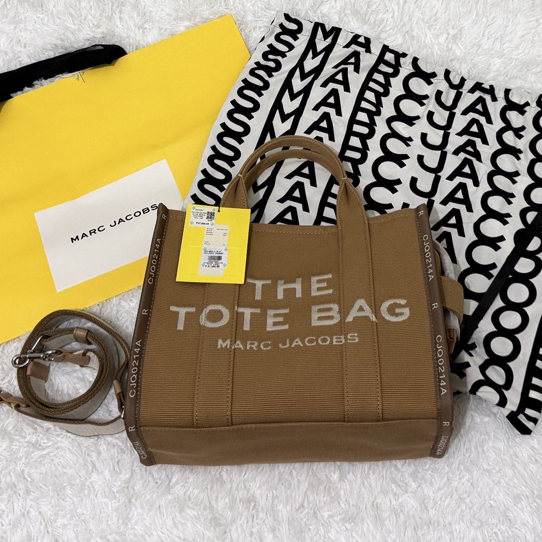 NEW Marc Jacobs The Jacquard Medium Tote Bag Camel (Category: Luxury Bags & Wallets) located in Manila. Submitted by paaaaat_2021 (Listing ID 1447273699, Image 1). Description: Marc Jacobs The Tote Bag - The Jacquard Medium Tote Bag Camel - original, bought in Greenbelt - brand new - with card, tag, dust bag, paper bag RFS: declutter P22,000 + SF (slightly negotiable).